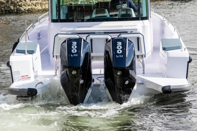  Yacht Photos Pics 2024 Axopar 37XC CROSS CABIN with dual 300 V8 engines on water.