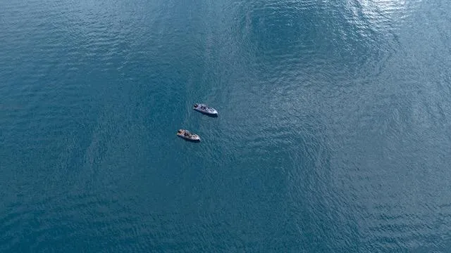  Yacht Photos Pics Two boats on calm blue water, featuring a 2025 SuperRib Open 30 model.