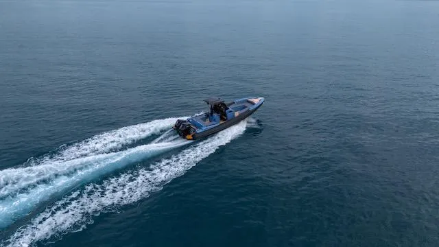  Yacht Photos Pics 2025 SuperRib Open 30 speeding on open water, creating a dynamic wake.