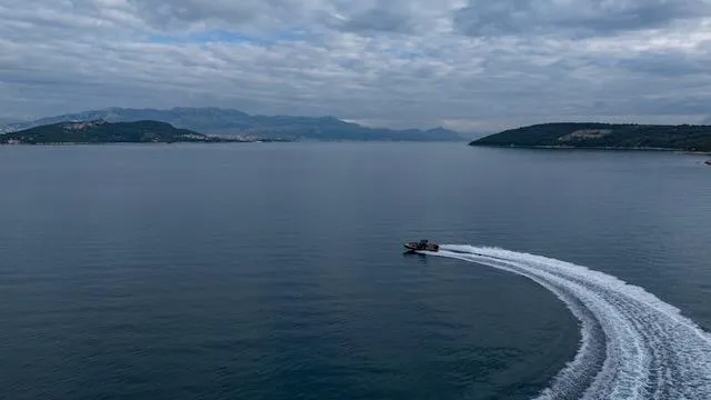  Yacht Photos Pics SuperRib Open 30 boat making a sharp turn on a calm sea, 2025 model.