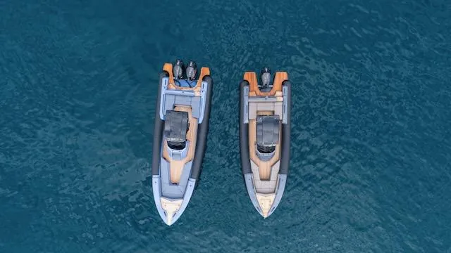  Yacht Photos Pics Two SuperRib Open 30 boats from 2025 on blue water, aerial view.