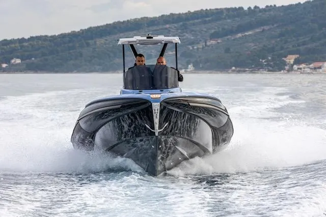  Yacht Photos Pics 2025 SuperRib Open 30 speedboat cruising on water, front view.