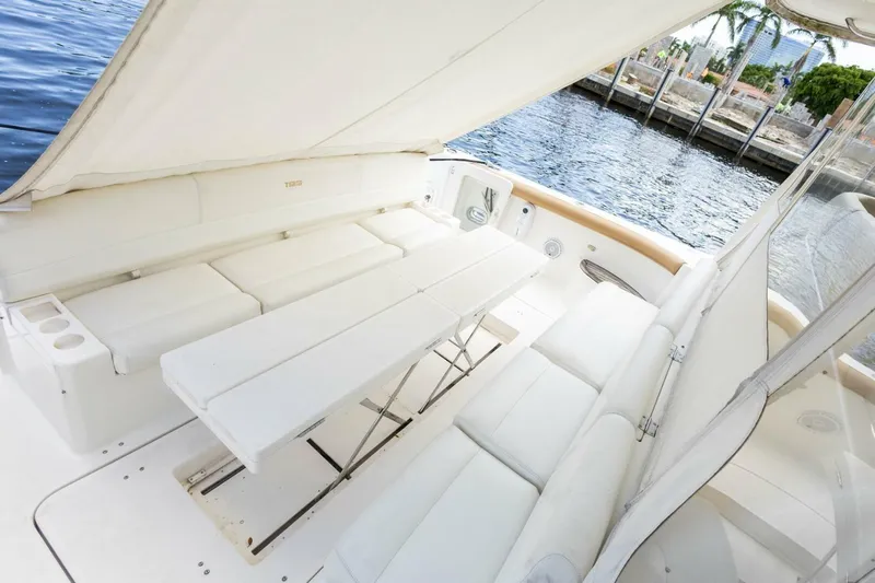  Yacht Photos Pics Luxurious seating area on a 2000 Tiara Yachts 5200 Express by the water.