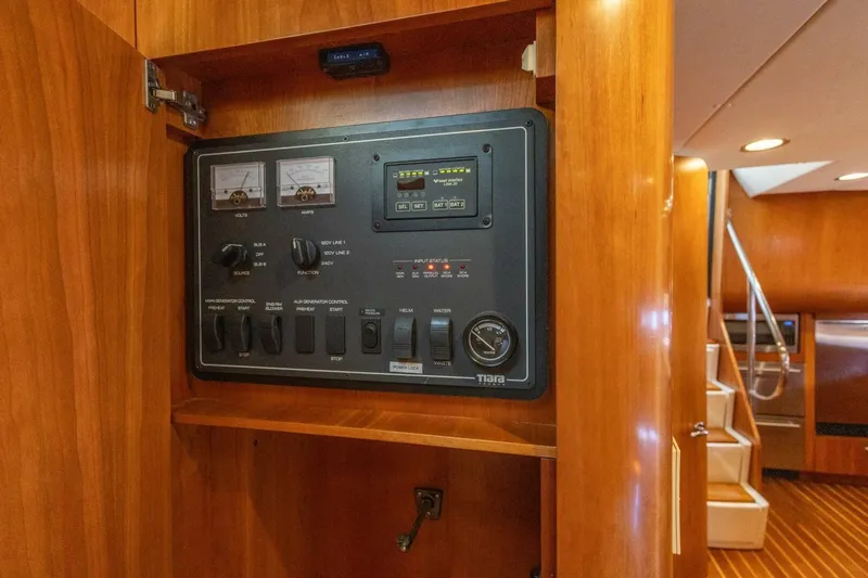  Yacht Photos Pics Electrical control panel on 2000 Tiara Yachts 5200 Express, featuring gauges and switches.