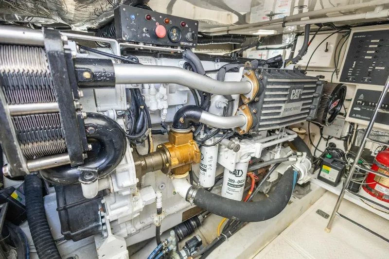  Yacht Photos Pics Engine room of 2000 Tiara Yachts 5200 Express, featuring CAT marine power system.