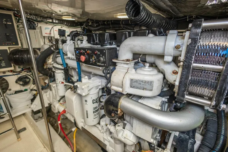  Yacht Photos Pics Engine room of 2000 Tiara Yachts 5200 Express, featuring Caterpillar machinery.