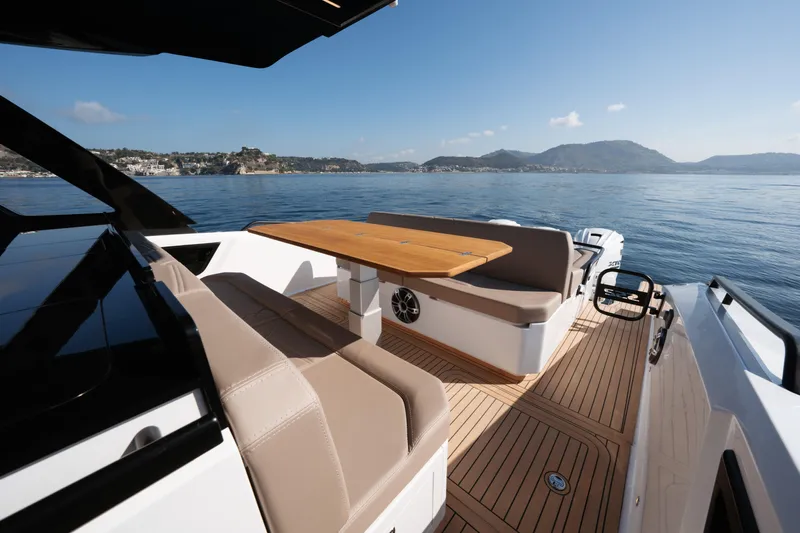  Yacht Photos Pics Luxurious 2025 Salpa Soleil 52 yacht with elegant seating and scenic ocean view.
