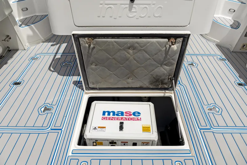  Yacht Photos Pics 2004 Intrepid 377 Walkaround with Mase generator in open hatch.
