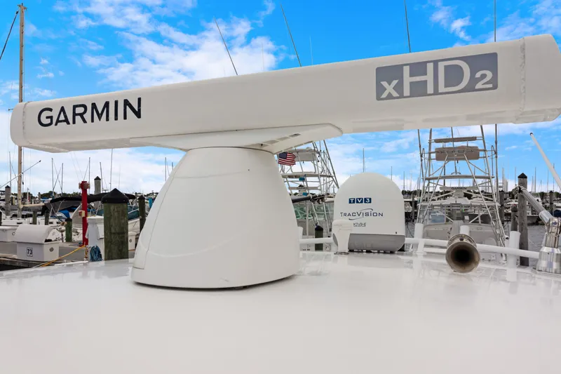 Yacht Photos Pics Garmin xHD2 radar on 2004 Intrepid 377 Walkaround boat, marina background.