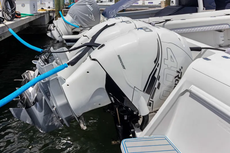  Yacht Photos Pics 2004 Intrepid 377 Walkaround with powerful outboard engines docked at marina.