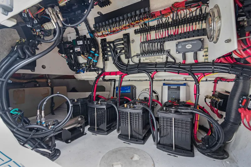  Yacht Photos Pics Electrical system of a 2004 Intrepid 377 Walkaround boat, showcasing wiring and components.