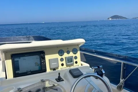  Yacht Photos Pics 2008 Ferretti Yachts 592 helm with ocean view and navigation equipment.