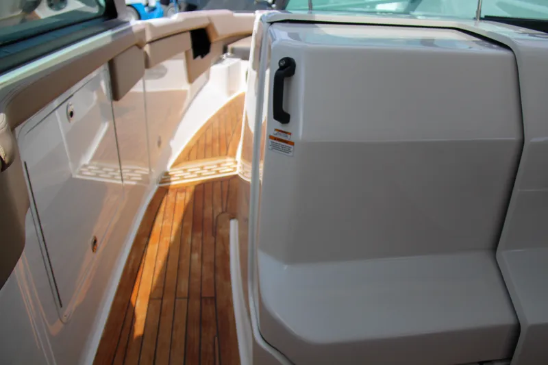  Yacht Photos Pics 2019 Sea Ray SLX 400 boat interior with teak flooring and sleek design.