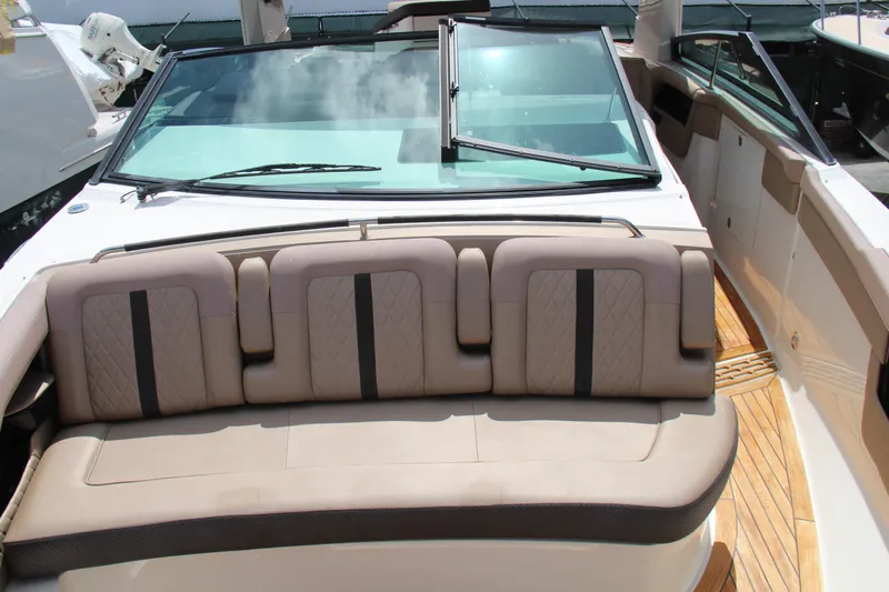  Yacht Photos Pics 2019 Sea Ray SLX 400 boat with beige seating and wooden deck.