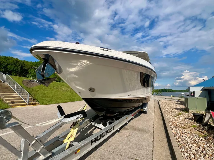  Yacht Photos Pics 2019 Sea Ray SLX 400 boat on trailer under a blue sky.