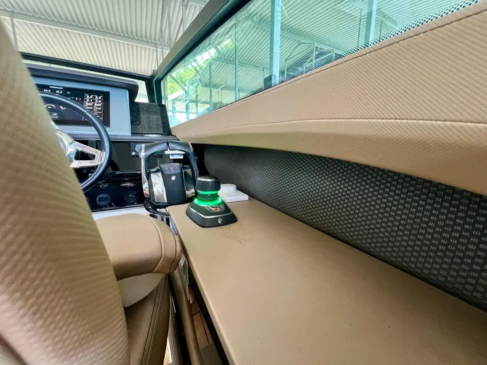  Yacht Photos Pics 2019 Sea Ray SLX 400 helm with modern controls and luxurious interior design.