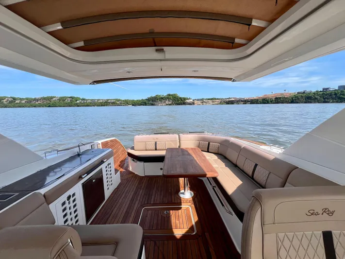  Yacht Photos Pics 2019 Sea Ray SLX 400 boat interior with luxurious seating and scenic water view.