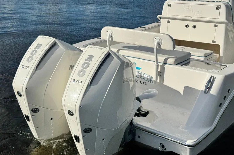  Yacht Photos Pics 2024 SeaVee 290B boat with dual Mercury 300 V8 engines in water.