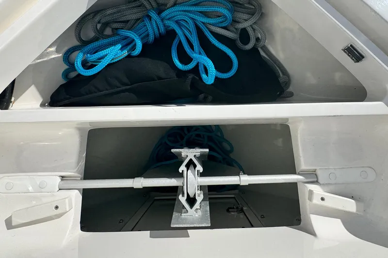  Yacht Photos Pics 2024 SeaVee 290B boat storage compartment with ropes and anchor.