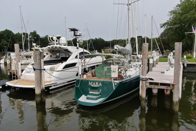 Mara Yacht Photos Pics Boats docked at marina, featuring 1998 Able Apogee 50 sailboat.