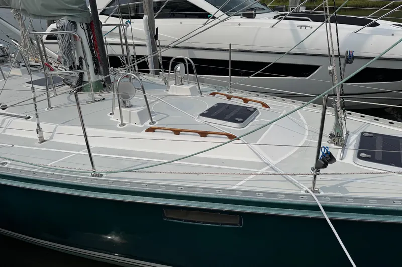 Mara Yacht Photos Pics Sailboat deck of 1998 Able Apogee 50, featuring rigging and hatches.