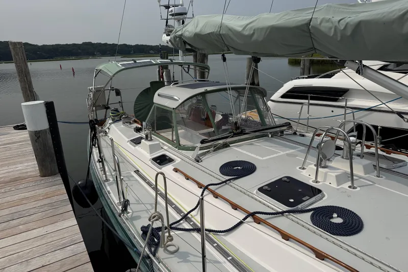 Mara Yacht Photos Pics Sailboat docked at marina, Able Apogee 50, 1998 model, with covered cockpit.