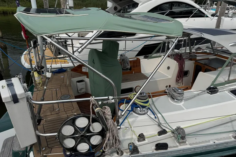 Mara Yacht Photos Pics Sailboat deck of 1998 Able Apogee 50 with green canopy and rigging details.