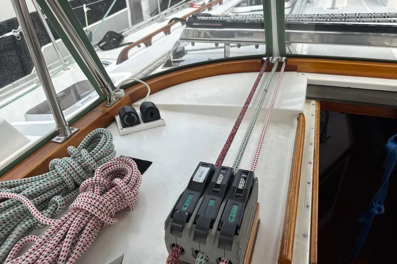 Mara Yacht Photos Pics Cockpit of 1998 Able Apogee 50 sailboat with ropes and control panel.