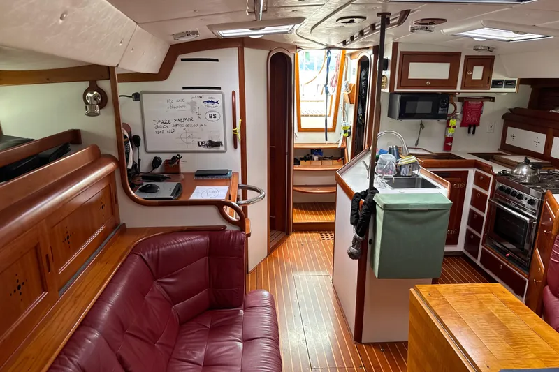 Mara Yacht Photos Pics Interior of 1998 Able Apogee 50 yacht with wood finish and modern amenities.