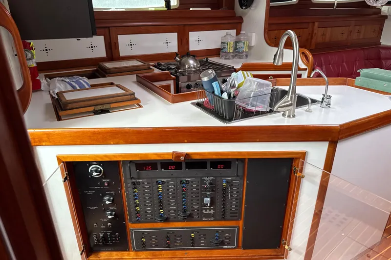 Mara Yacht Photos Pics 1998 Able Apogee 50 yacht interior with kitchen and control panel.