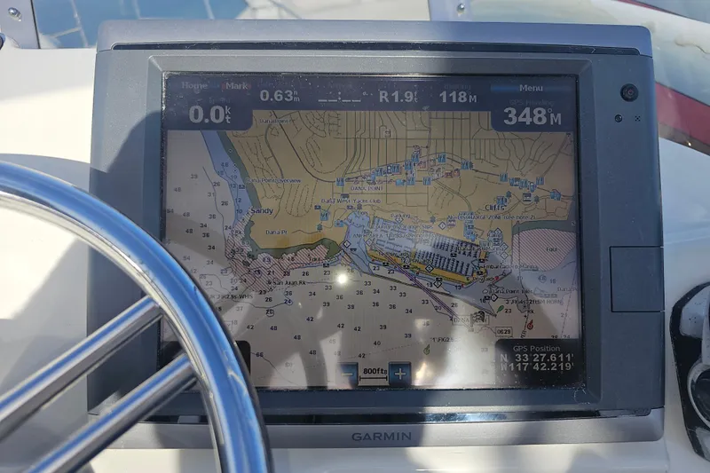 Tuva- B - Lu Yacht Photos Pics Garmin GPS display on 2015 Cutwater 30 Command Bridge, showing nautical chart and coordinates.