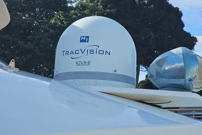 Tuva- B - Lu Yacht Photos Pics TracVision M1 satellite dome on 2015 Cutwater 30 Command Bridge boat, outdoor setting.