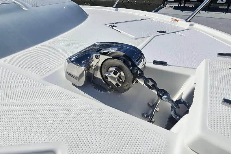 Tuva- B - Lu Yacht Photos Pics 2015 Cutwater 30 Command Bridge anchor winch on deck, showcasing marine equipment.