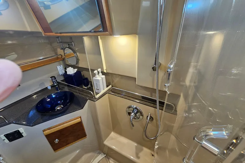 Tuva- B - Lu Yacht Photos Pics Luxurious bathroom in 2015 Cutwater 30 Command Bridge yacht with modern fixtures.