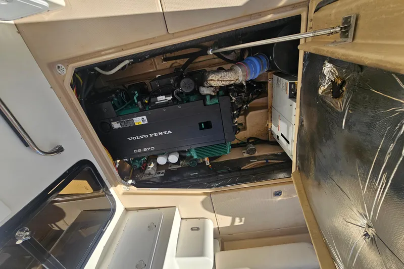 Tuva- B - Lu Yacht Photos Pics Engine compartment of a 2015 Cutwater 30 Command Bridge with Volvo Penta D6-370 engine.