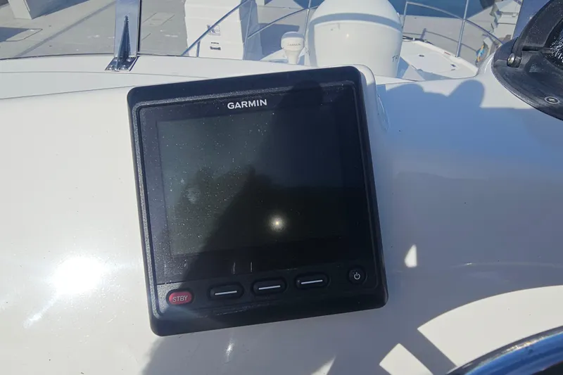 Tuva- B - Lu Yacht Photos Pics Garmin navigation display on 2015 Cutwater 30 Command Bridge boat dashboard.