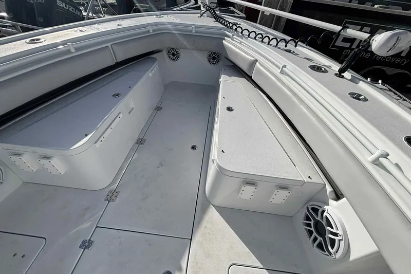 El Viaje Yacht Photos Pics 2023 Andros Offshore 32 boat interior with storage compartments and speakers.