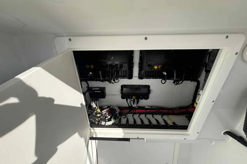 El Viaje Yacht Photos Pics Electrical panel inside 2023 Andros Offshore 32 boat, showcasing wiring and components.