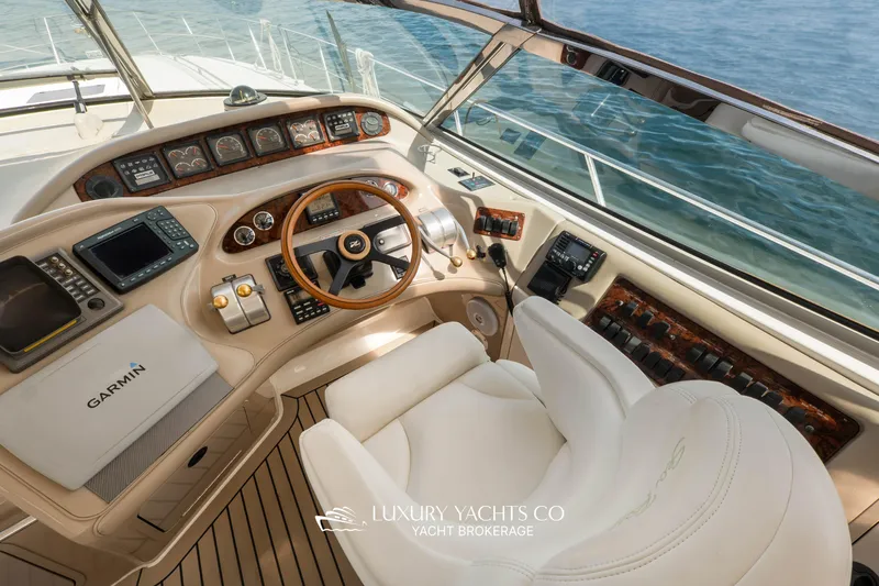  Yacht Photos Pics Cockpit of 1999 Sea Ray Sundancer 540 yacht with Garmin navigation system.