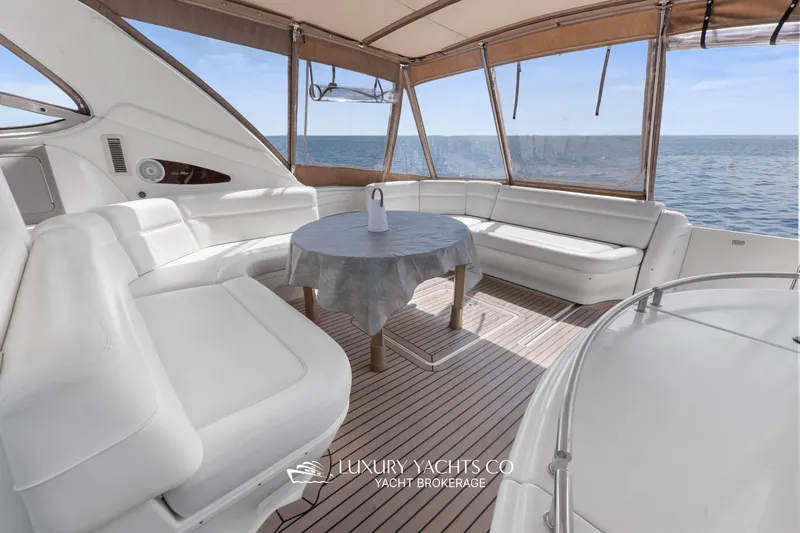  Yacht Photos Pics Luxurious 1999 Sea Ray Sundancer 540 yacht interior with ocean view and elegant seating.