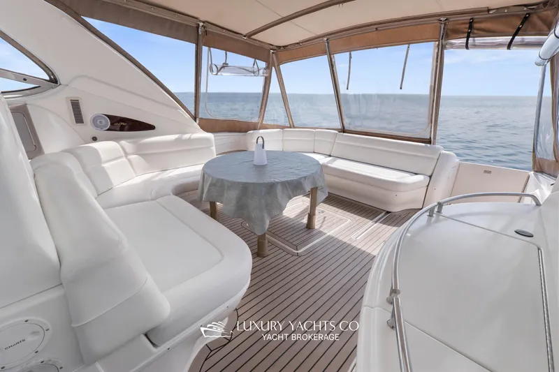  Yacht Photos Pics Luxurious 1999 Sea Ray Sundancer 540 yacht interior with elegant seating and ocean view.