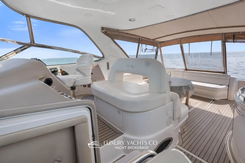  Yacht Photos Pics 1999 Sea Ray Sundancer 540 yacht interior with elegant seating and ocean view.