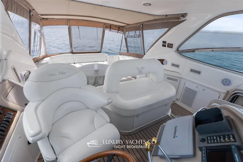  Yacht Photos Pics Luxurious 1999 Sea Ray Sundancer 540 yacht interior with plush seating and ocean view.