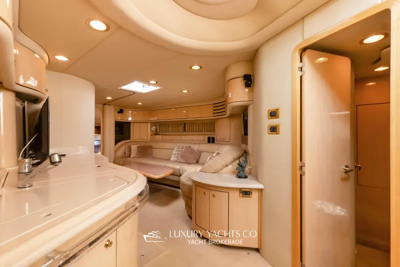  Yacht Photos Pics Luxurious interior of 1999 Sea Ray Sundancer 540 yacht with elegant furnishings.