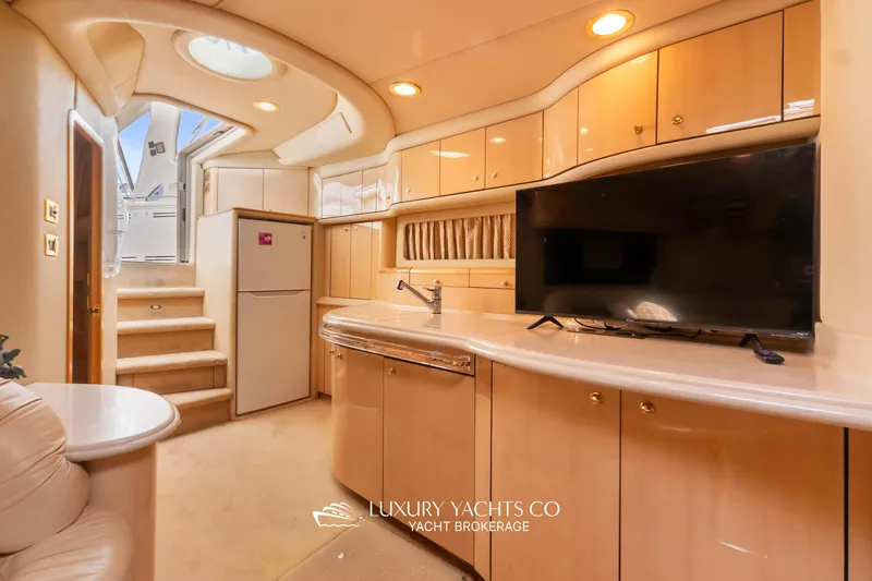  Yacht Photos Pics Luxurious interior of 1999 Sea Ray Sundancer 540 yacht with modern amenities.