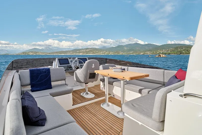  Yacht Photos Pics 2026 Beneteau Swift Trawler 48, spacious deck with seating, ocean view.