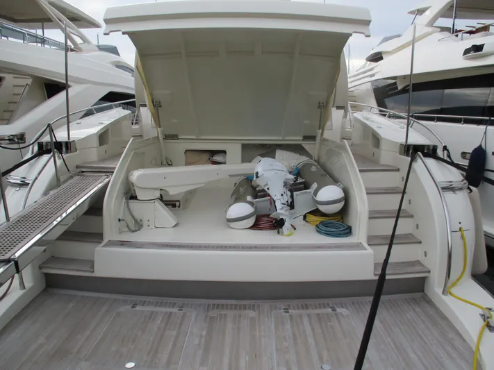 Mr Chic Yacht Photos Pics 2001 Riva 84 Cantata yacht with open storage compartment and equipment.