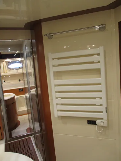 Mr Chic Yacht Photos Pics Bathroom interior of 2001 Riva 84 Cantata yacht with towel warmer.