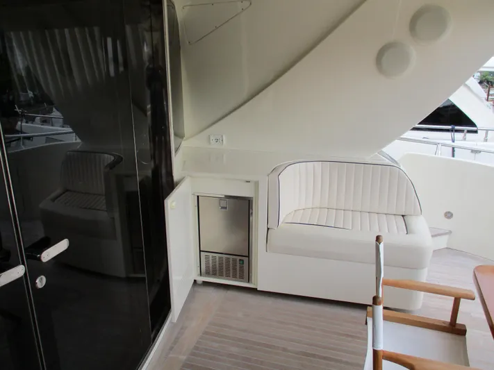 Mr Chic Yacht Photos Pics Luxury seating area on 2001 Riva 84 Cantata yacht deck.