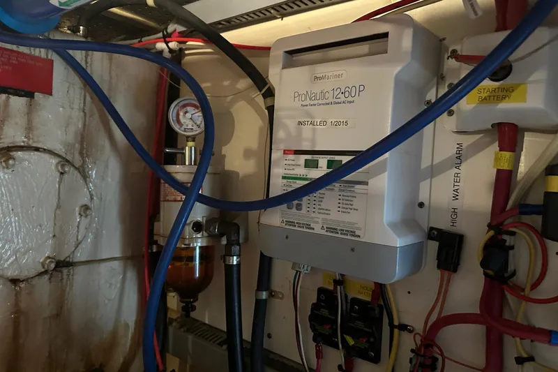 Off Ramp Yacht Photos Pics Electrical system in a 2002 Novatec Sundeck boat, featuring ProNautic 12:60P charger.